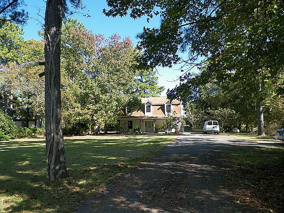 The house sits back from the road. Your pets are provided safety with an automatic gate to keep them in the yard.