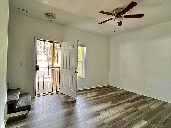 Another angle looking at the front door. Steps to the left take you upstairs.