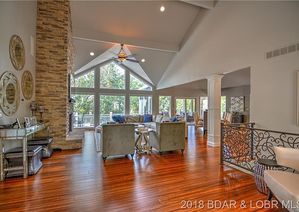 The home has been completely refurbished and has a flair unlike most you will find at the lake. Beautiful wood floors, custom ca