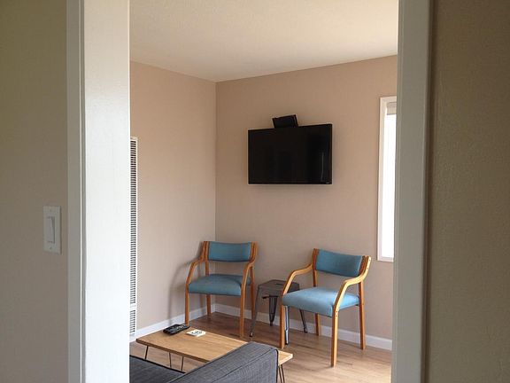 Living room/ TV included Living room chairs have been replaced with different ones.