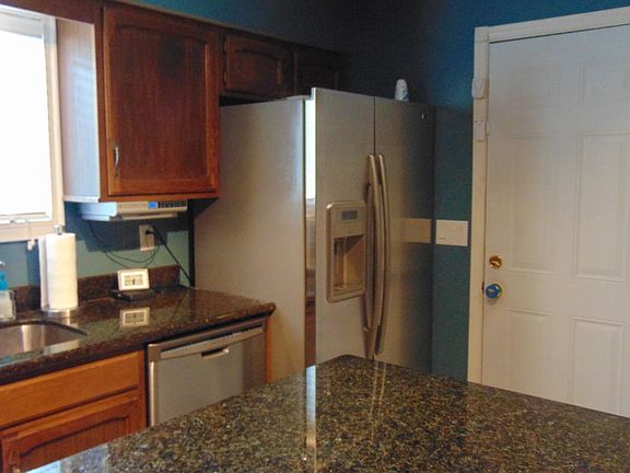 kitchen w granite & stainles