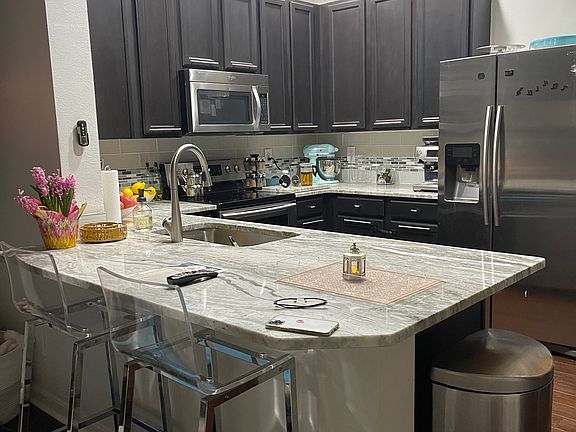 2nd image of 9418 W Park Village Dr APT 108