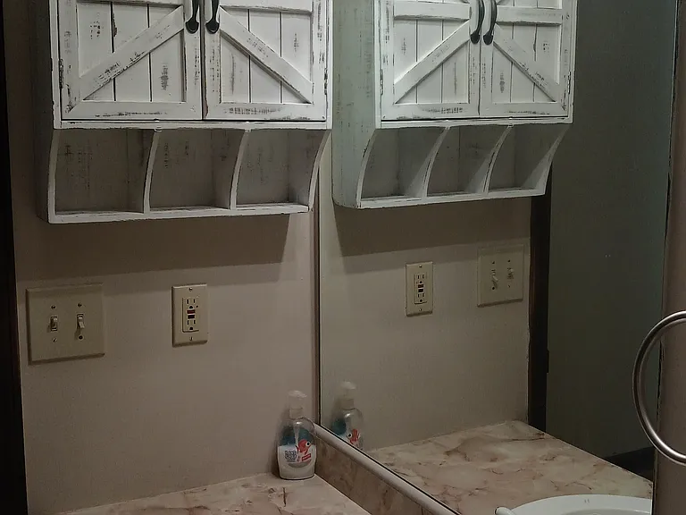 Hallway bathroom w extra storage cabinet