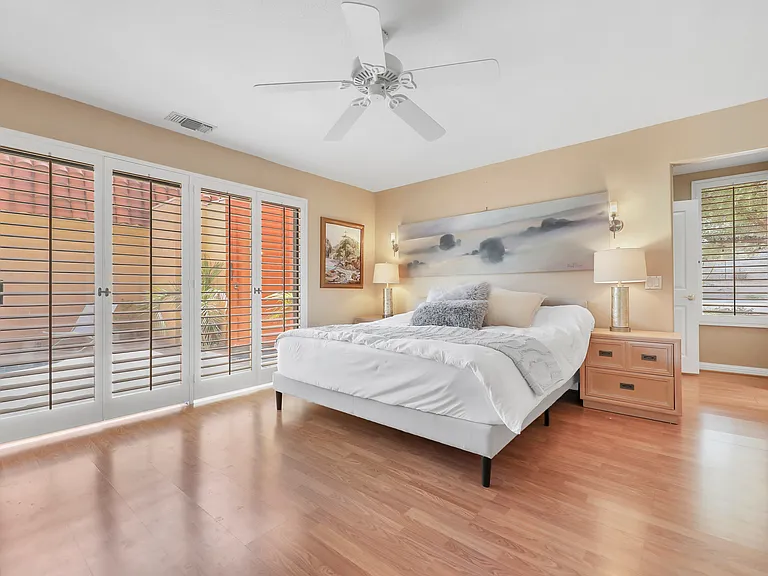 Primary bedroom and retreat. Step out of the sliding doors to relax in your spa unter the majestic desert stars.