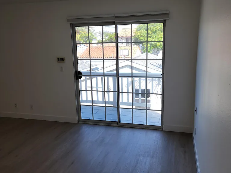 Master bedroom with balcony.