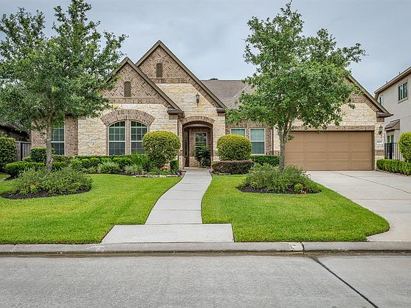 Welcome home to 8207 Caroline Ridge! Home is located in a prestigious GATED community and is on a PRIME golf course lot!