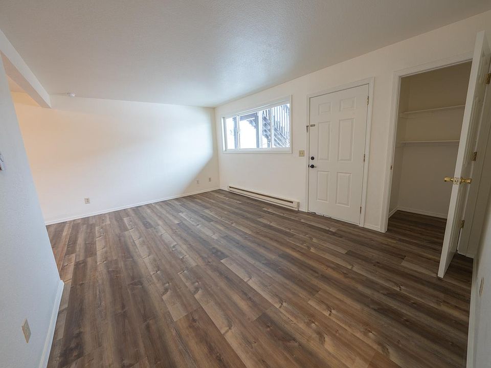 Living room/front door. Coat closet in the right hand corner.