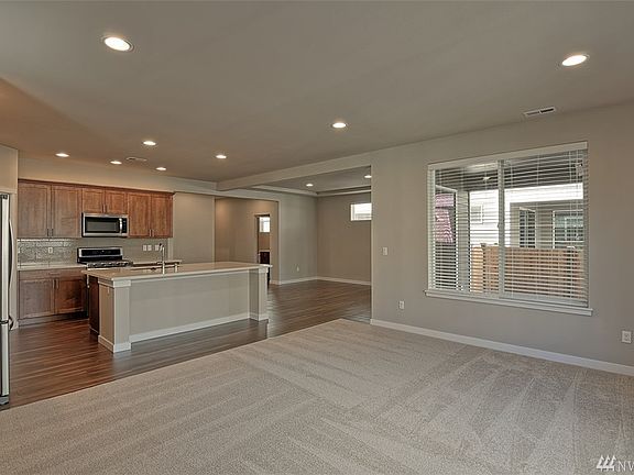Photos are of The Hampshire floor plan and are for illustration purposes only to reflect typical finishes.  May depict seller enhancements.  Colors and options may vary.