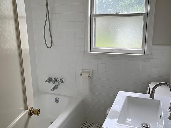 1st Floor - Full Bath *updated with new vanity, toilet, and tile