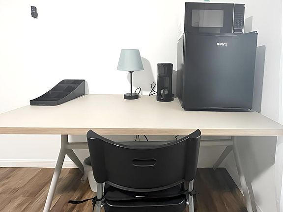 Study area and bedroom kitchenette