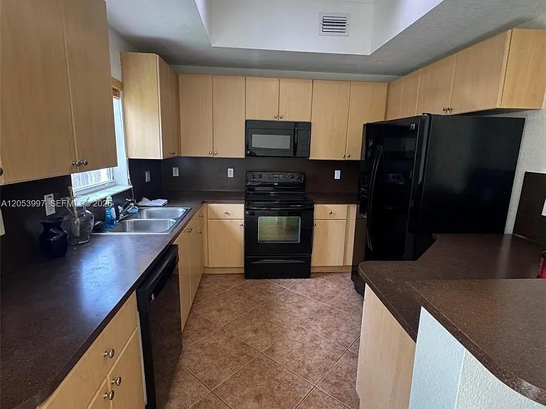 8908 SW 223rd Ter #8908 — Photo 2