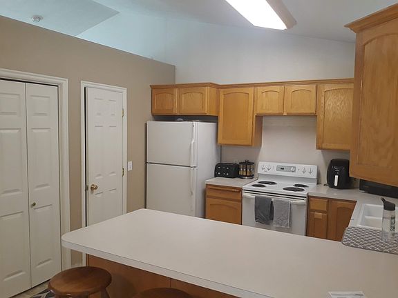 Kitchen with vaulted ceiling