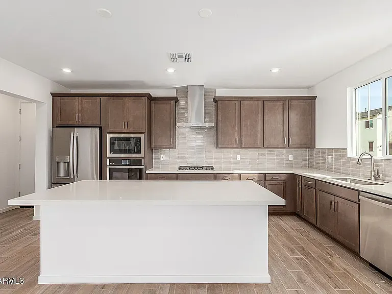 2488 W Rowel Rd — Photo 3