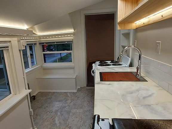 View of the kitchen facing toward the living room doorway