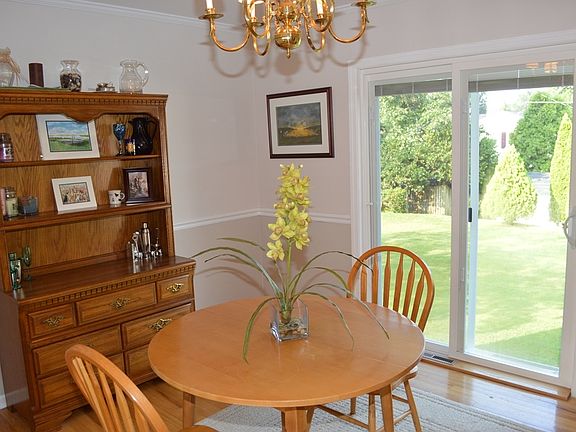 Dining room w/ french doors overlooking rear yard