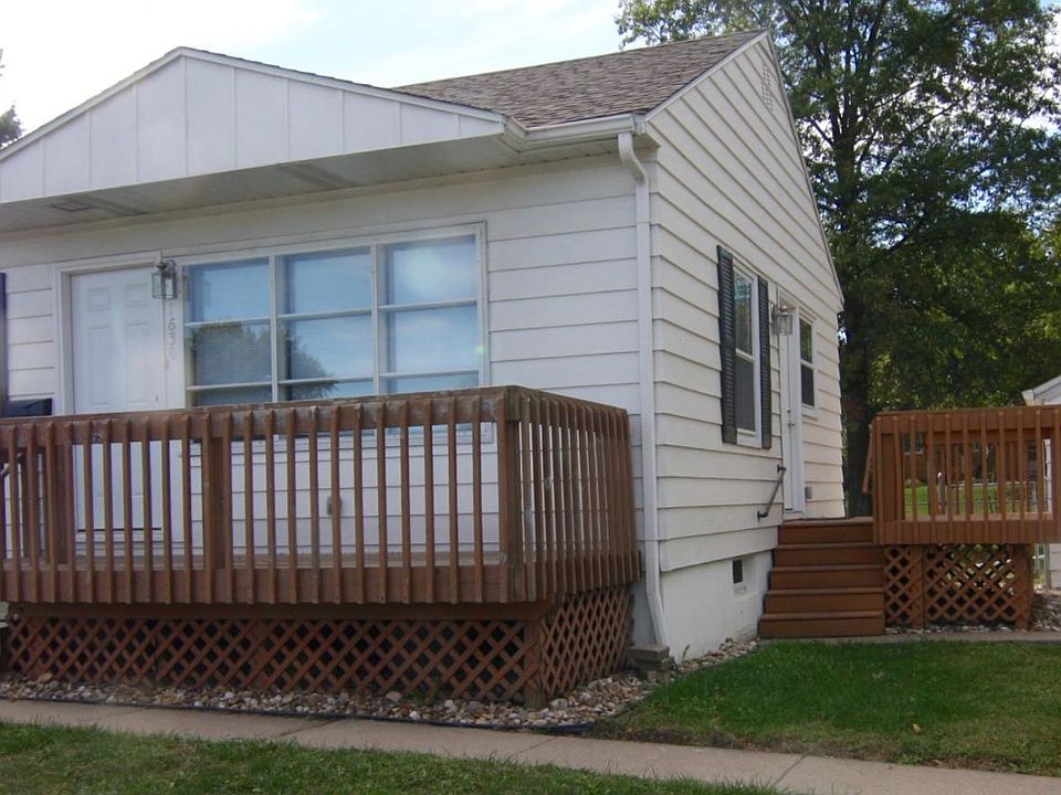 House with large fenced in backyard