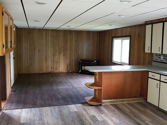 Kitchen and den. heater is no longer there.