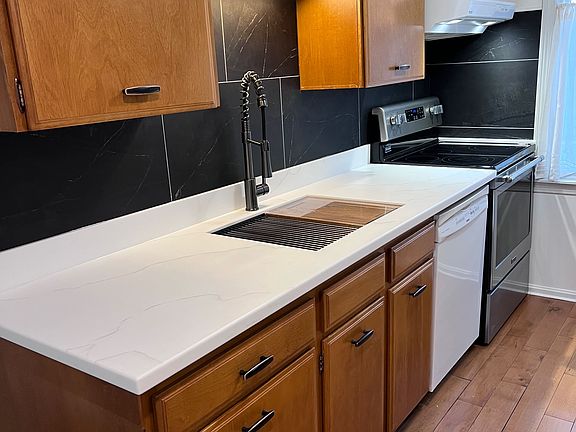 Kitchen (new countertops, sink, faucet, and backsplash)