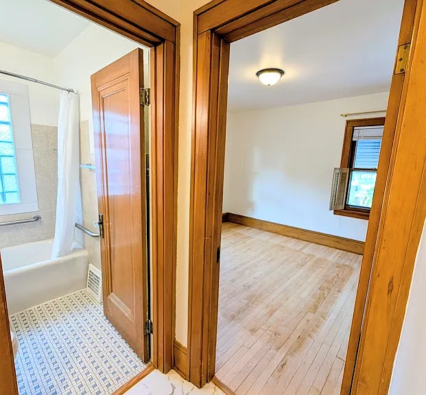 [UPPER UNIT]: leading into second bedroom