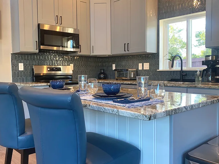 Gorgeous lighting options including under counter lighting and dimmable ceiling can-lights.
