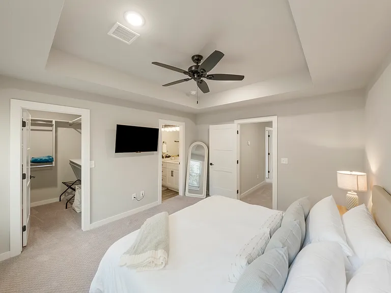 Master bedroom has a walk in closet and en suite bathroom