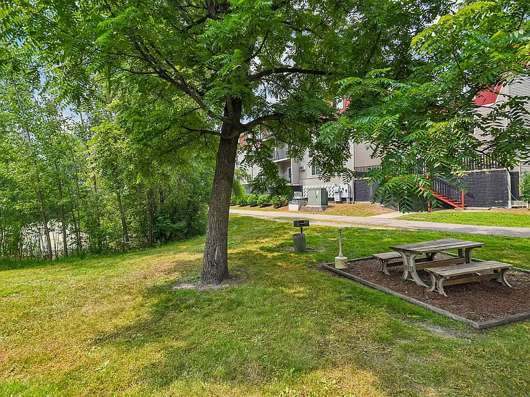 Relax in the serene outdoor space of Mill Pond Apartments, perfect for gatherings or quiet moments. Enjoy lush greenery and community amenities right at your doorstep. See how this vibrant lifestyle fits youschedule a tour today!
