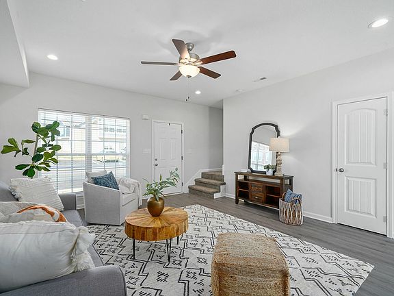Spacious Living Room with Wood Style Flooring