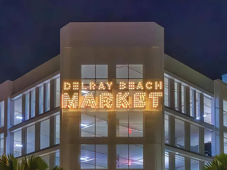 Local Market Destination with Bold Lit Sign Close to South of Atlantic