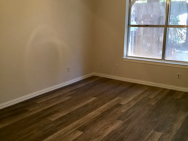 Updated bedroom with ceiling fan