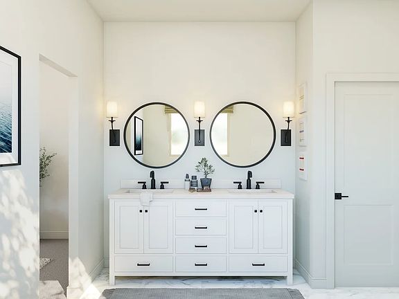 Primary bath features freestanding vanity with dual sinks
