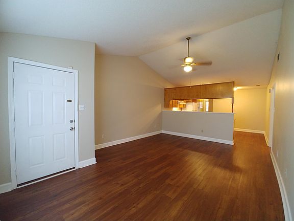 Living room with vaulted ceiling