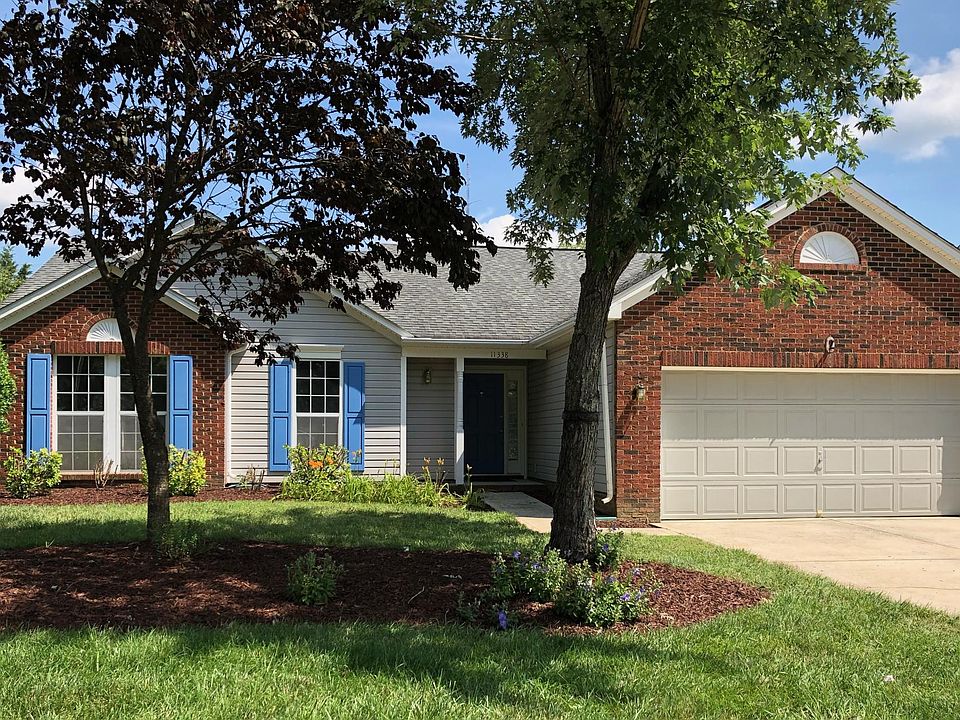 Single story ranch style home with professionally landscaped and private yard