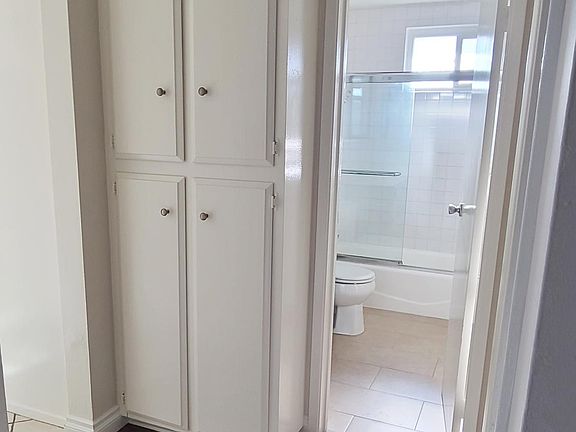 There are two sets of hall storage cabinets including the one seen here.