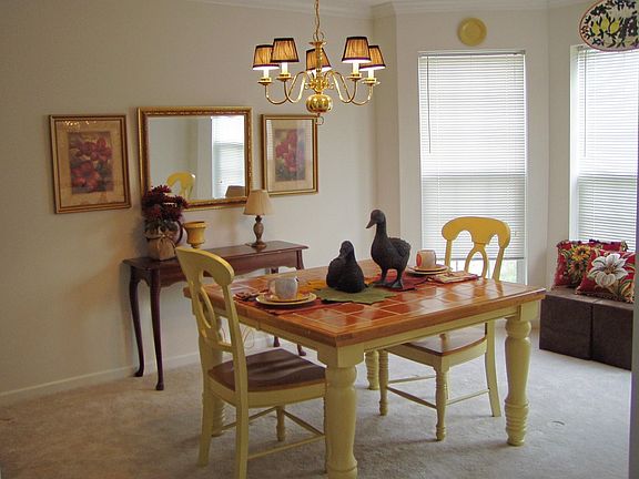 Formal dining room with bay window