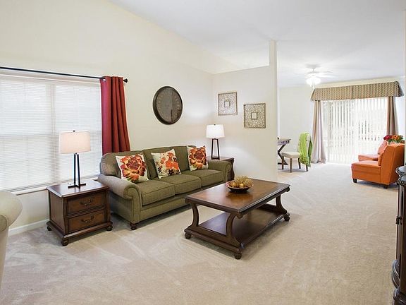 Open floorplan living areas with vaulted ceiling