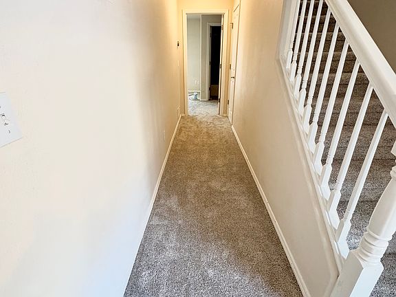 downstairs hallway to bedroom
