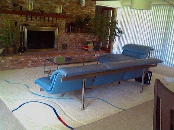 Lvng room with 16 foot glass slider to patio/pool