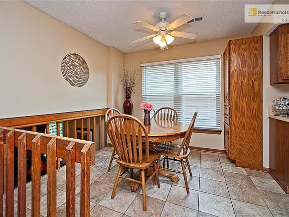 Eating Area Open to Family Room w/Ceramic Tile & Ceiling Fan