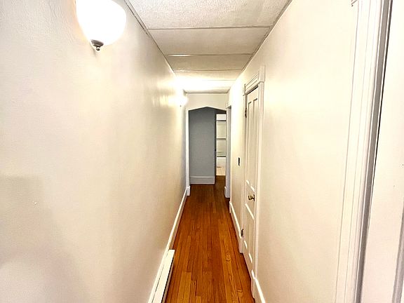 Hallway with closets