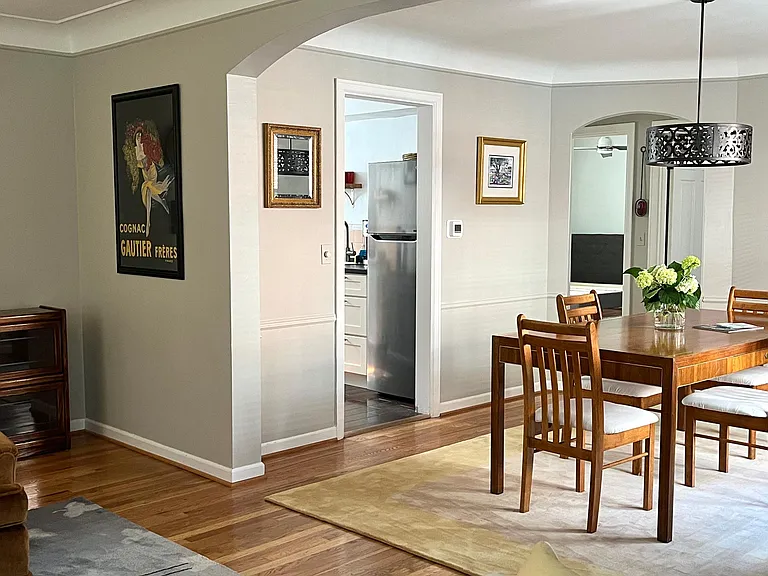Dining room with opening to full kitchen.