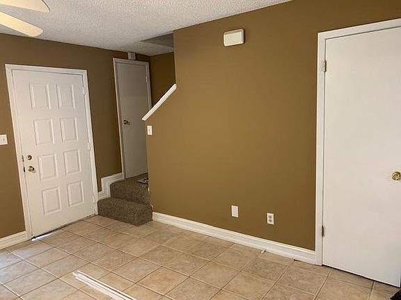 Front door, stairs, closet (next to entrance), first floor bathroom on the right