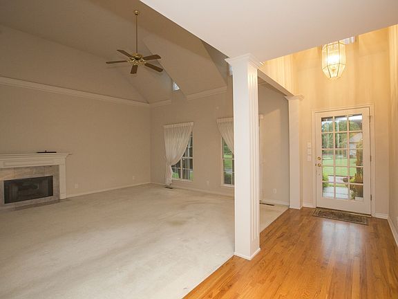 Hardwood front entry opens to Living