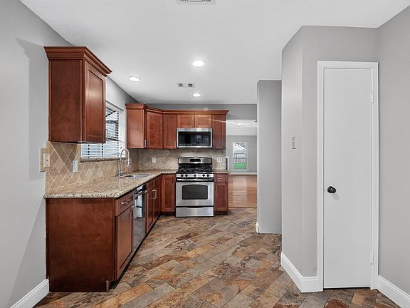 5th image of 7760 High Village Dr