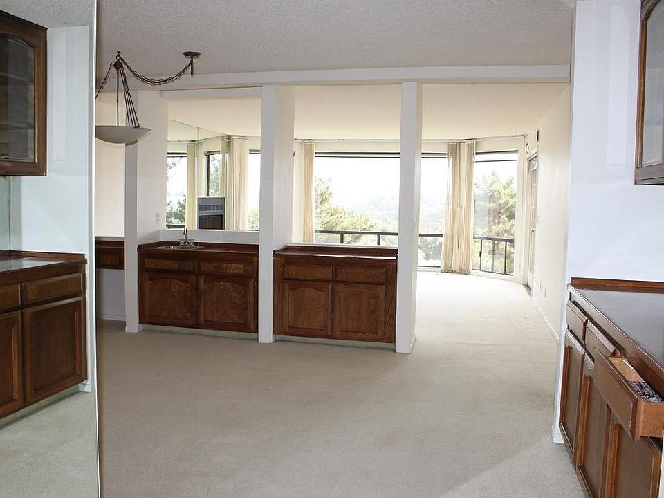 bright light entrance way that leads to dining room and living area