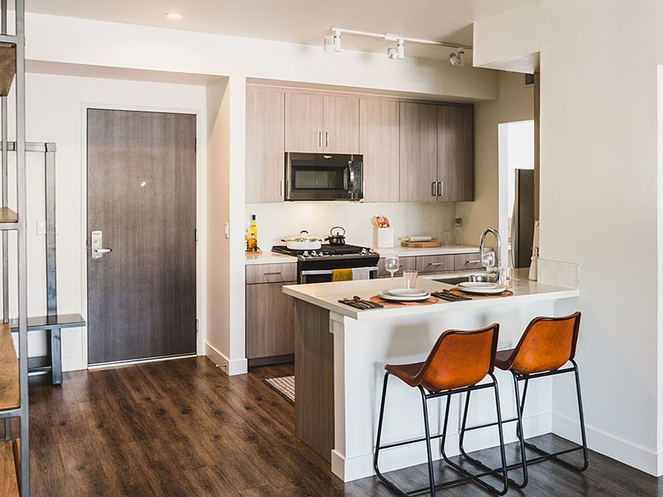 Chef-inspired kitchens enhance your entertaining skills with Caesarstone_ quartz countertops, tile backsplashes and under-cabinet task lighting