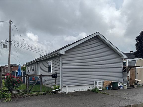 front entrance and patio and shed