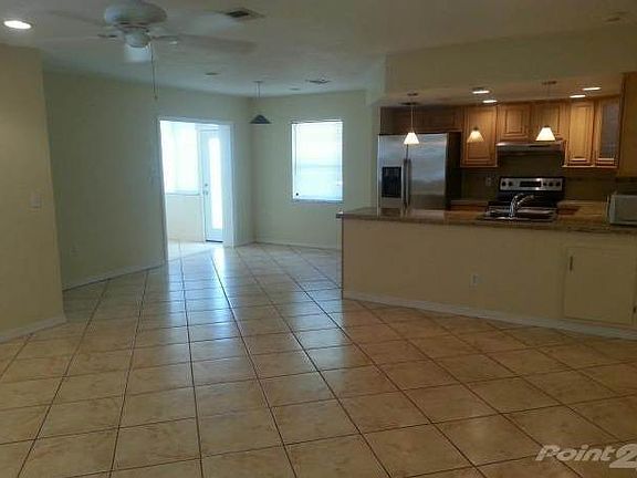 Ceramic tile flooring & Recessed Lighting throughout