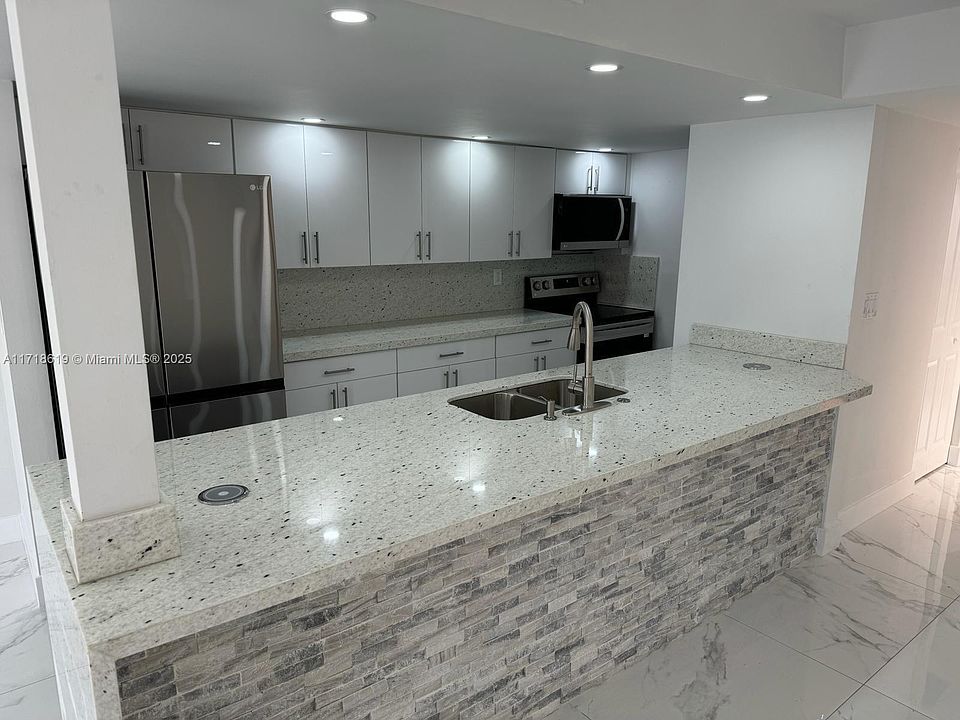 1st image of 830 W 40th Dr #11