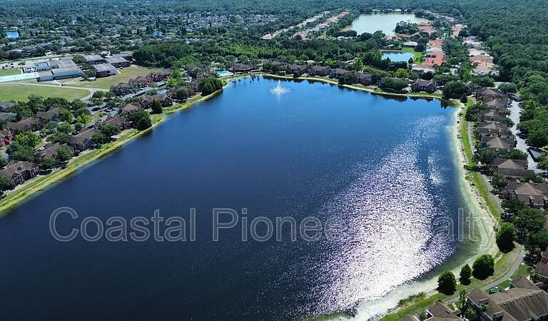 9232 Lake Chase Island Way — Photo 38
