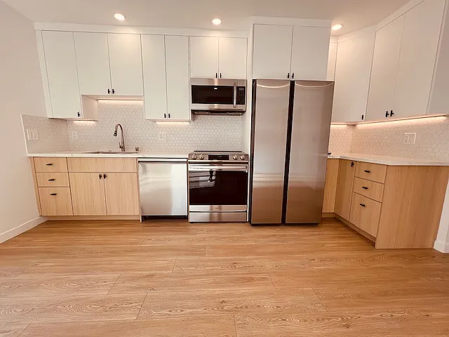 kitchen area with under counter lighting